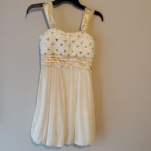 Xtraordinary Cream Dress with Star Accents